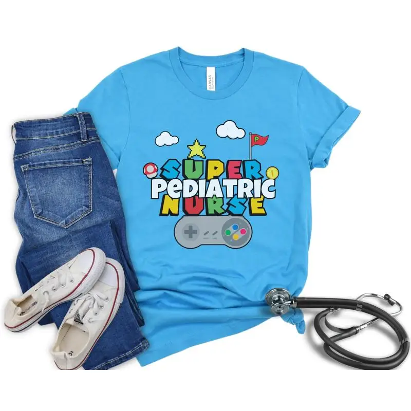 Retro Gaming Gamestop - Maglietta da Infermiera Pediatrica con Tema